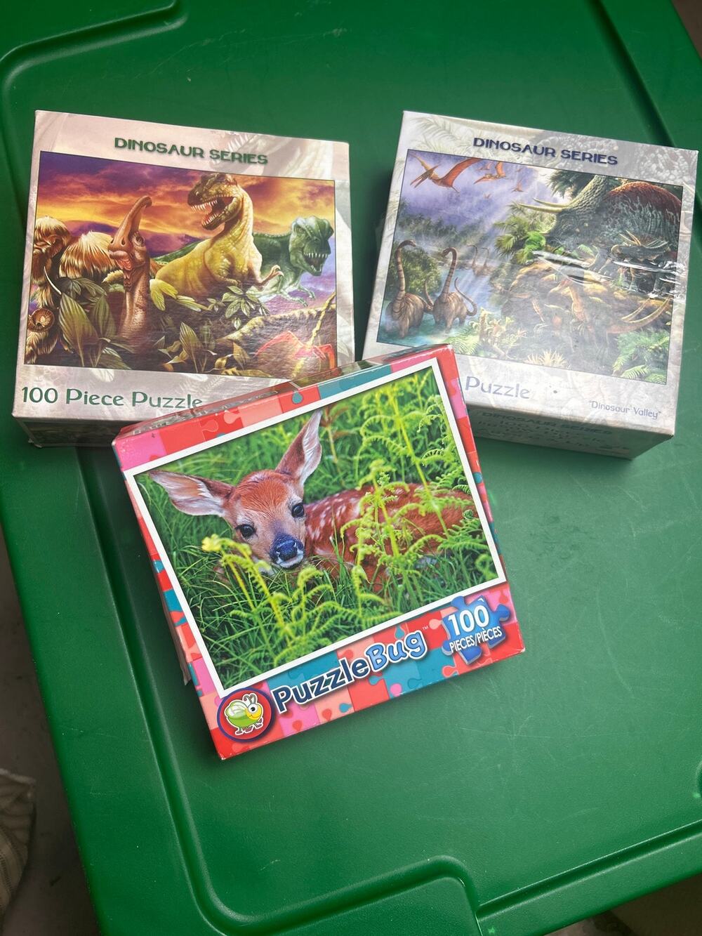 Puzzles - beginners. (3) 100 piece- dinosaurs & fawn